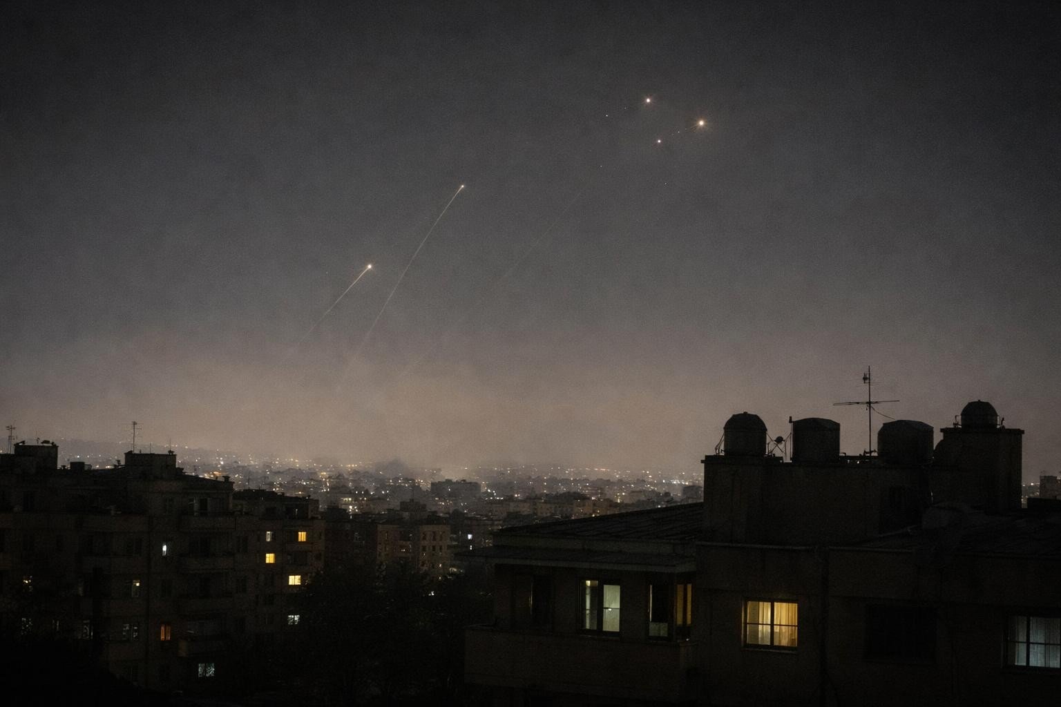 Damascus explosions reported as Syria air defences respond